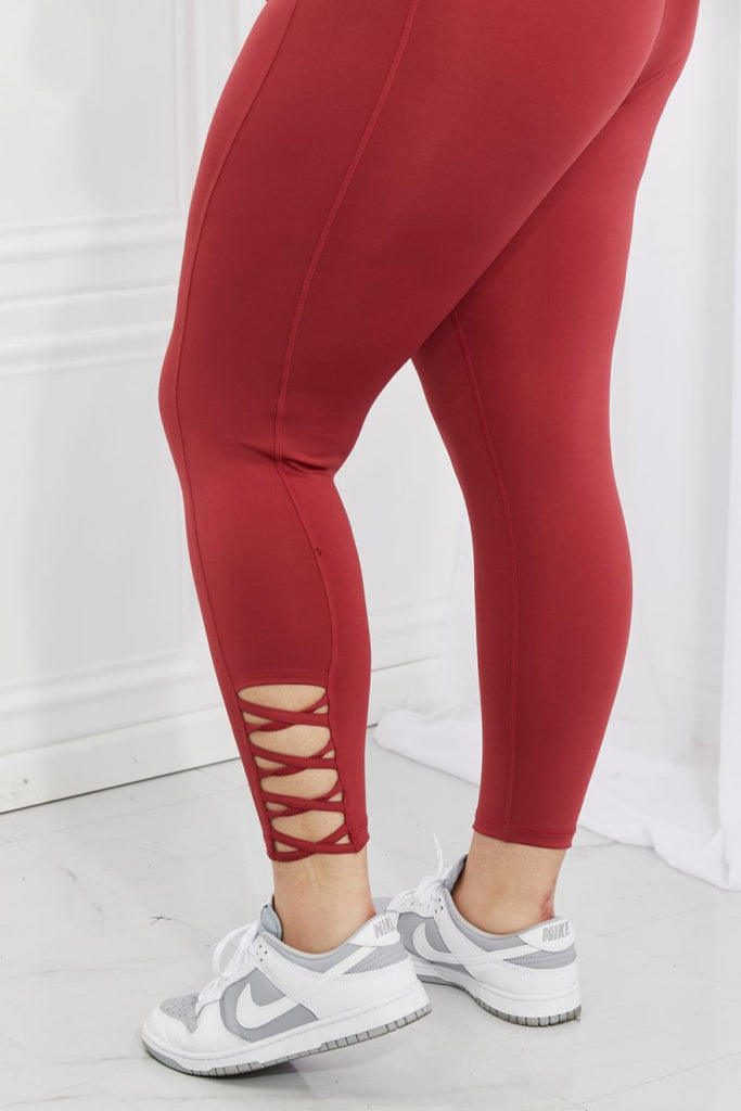 Yelete Ready For Action Full Size Ankle Cutout Active Leggings in Brick Red - Willow & Luna