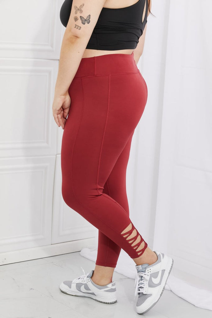 Yelete Ready For Action Full Size Ankle Cutout Active Leggings in Brick Red - Willow & Luna